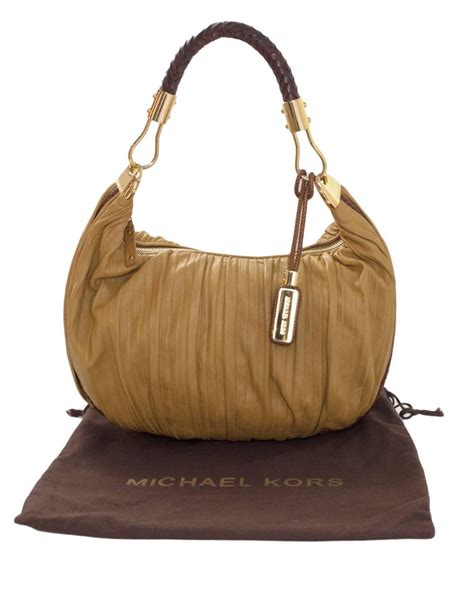 michael kors tan leather braided bag skorpios|Michael Kors Skorpios for sale .